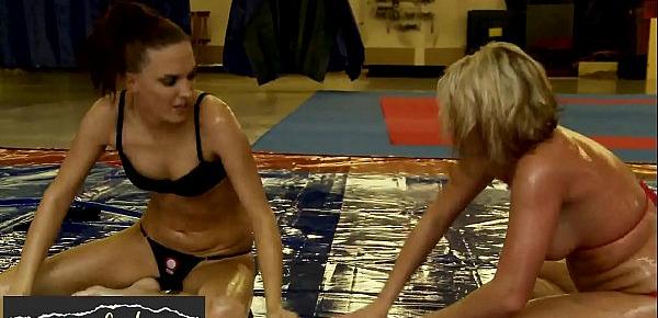  Lesbian babes in bikini wrestling while oiled